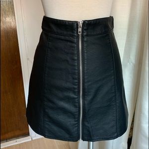 Black Faux Leather skirt. Front full zipper.